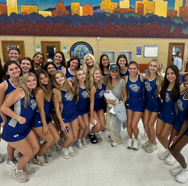 Christal with McCallum cheerleaders